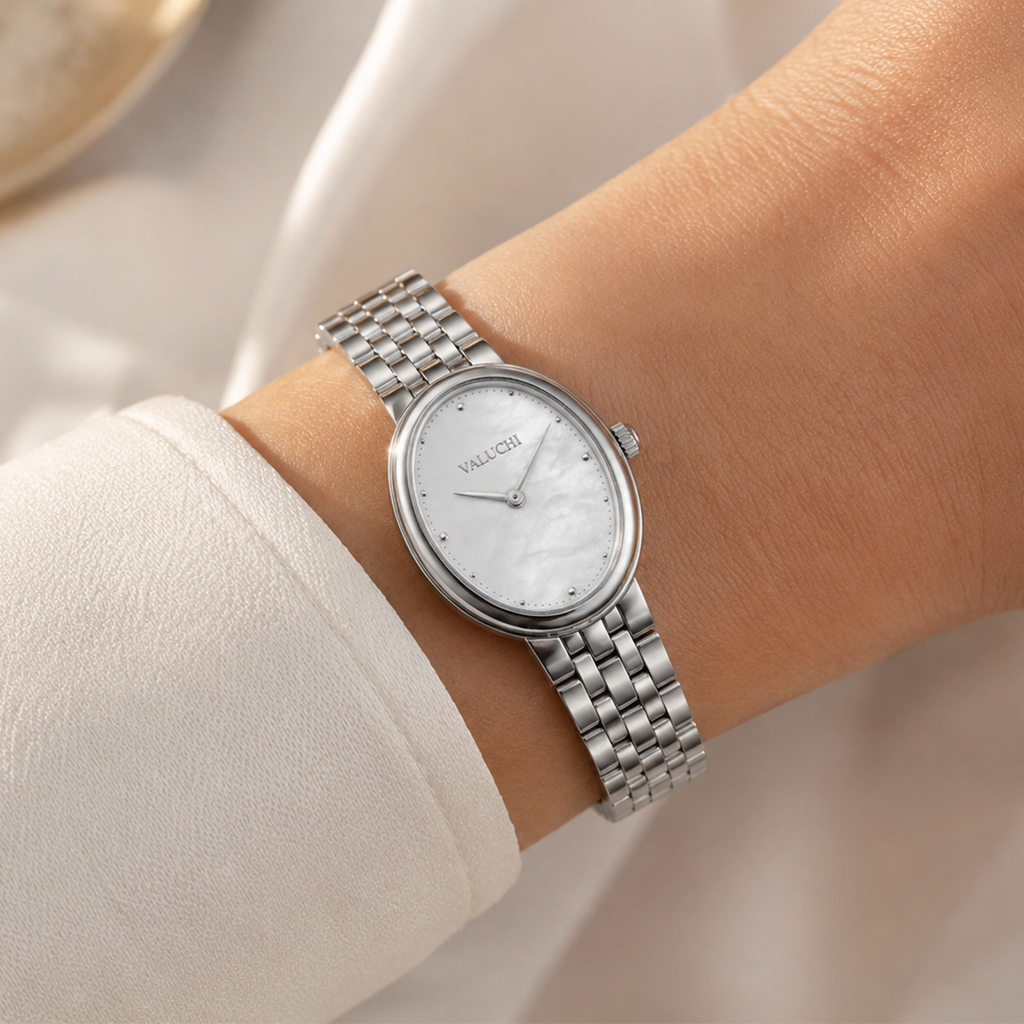 White oval women’s watch worn on the wrist